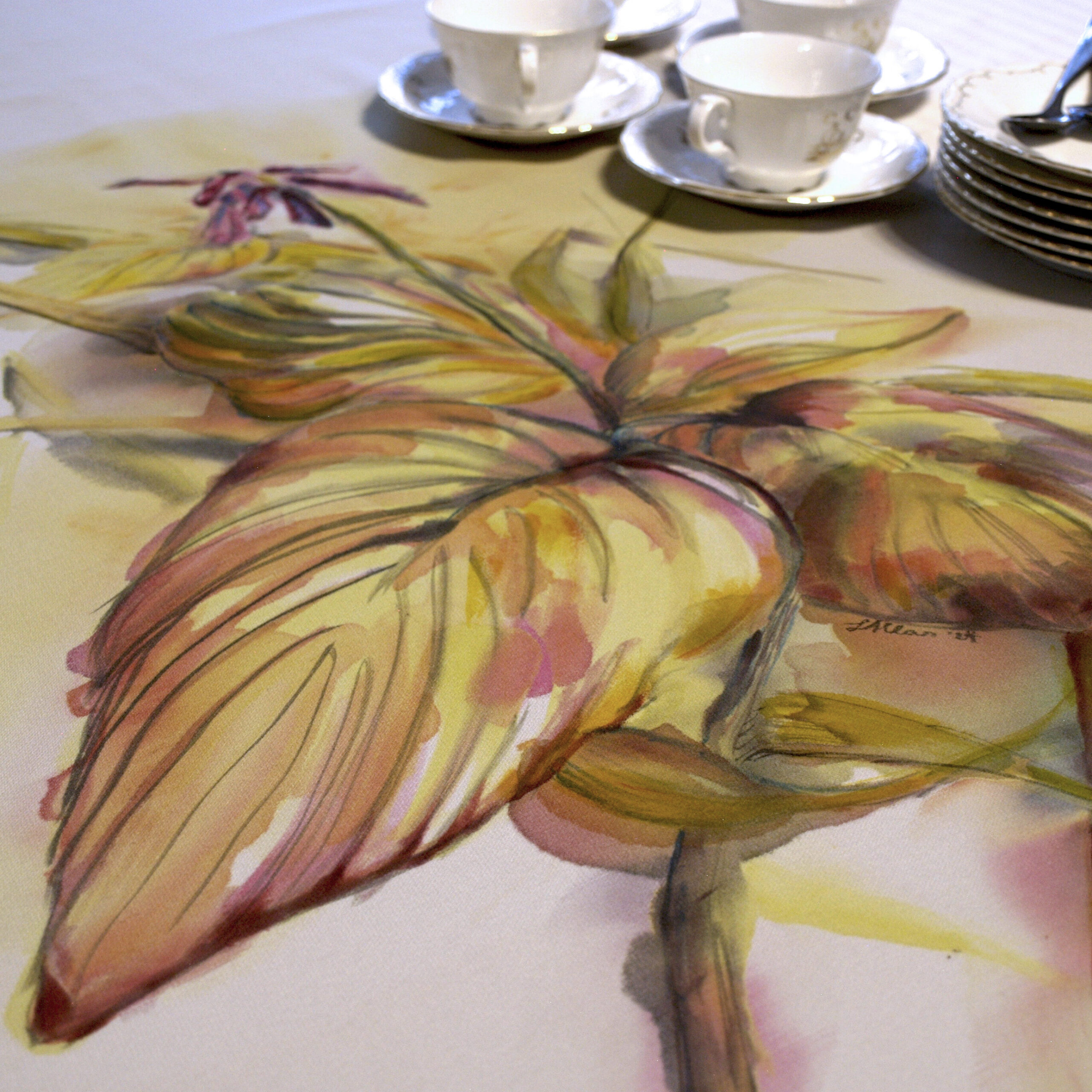 Hand-painted tablecloth featuring a hosta in autumn colors
